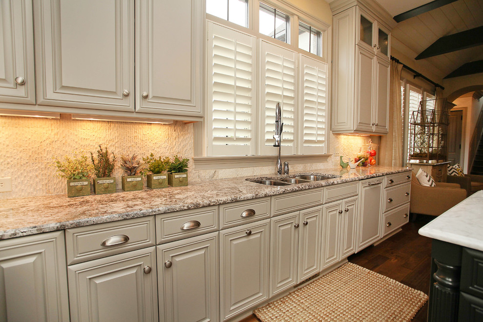 Inspiration for a traditional grey and cream kitchen in Charlotte.
