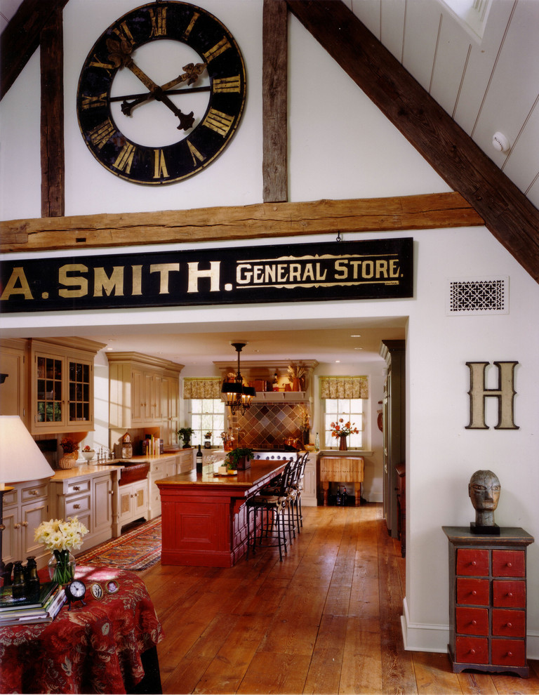 Eclectic kitchen photo in Philadelphia with recessed-panel cabinets, beige cabinets and brown backsplash