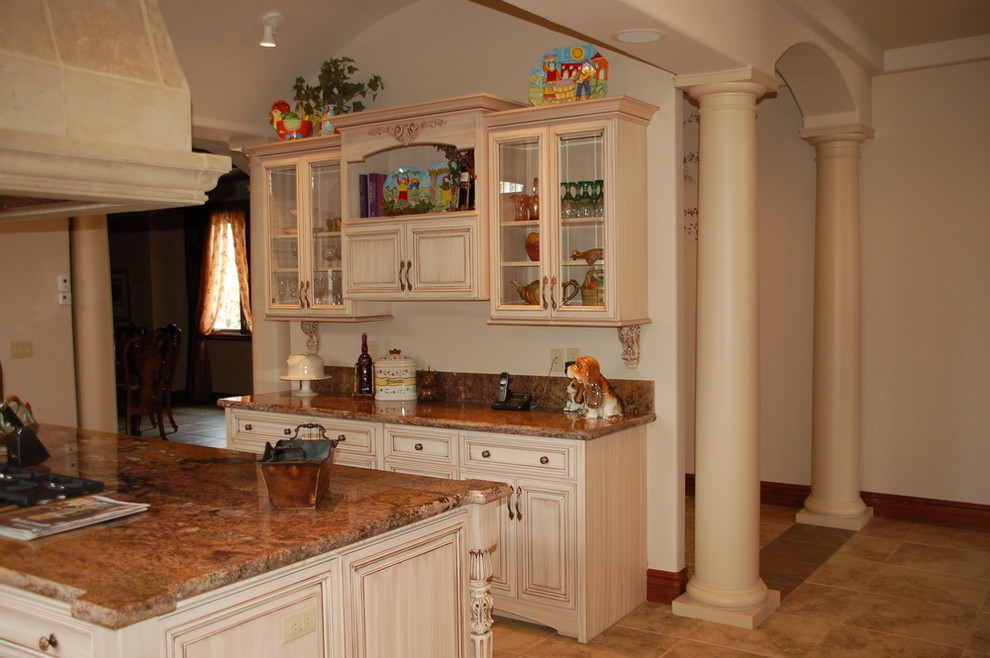 Photo of a medium sized traditional galley kitchen/diner in Denver with a built-in sink, raised-panel cabinets, medium wood cabinets, onyx worktops, stainless steel appliances, ceramic flooring, no island and brown floors.