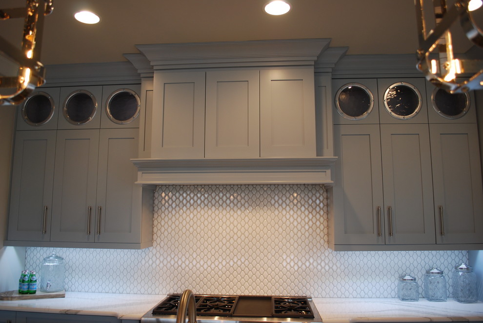 Beach style kitchen photo in Wilmington with shaker cabinets