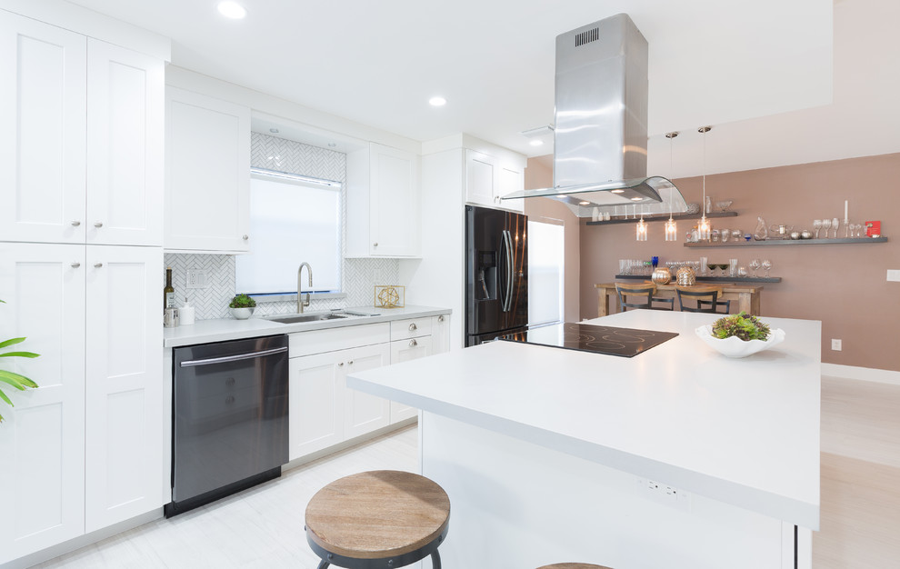 Example of a small transitional single-wall porcelain tile open concept kitchen design in Miami with an undermount sink, shaker cabinets, white cabinets, quartz countertops, white backsplash and an island