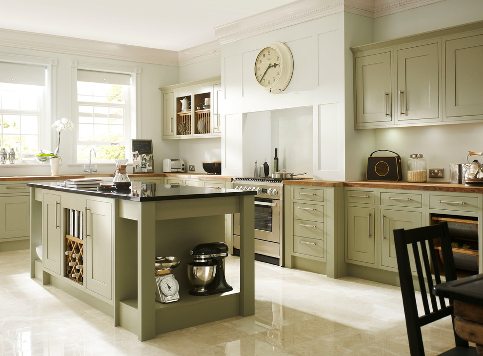 Kitchen - large transitional l-shaped travertine floor kitchen idea in Other with shaker cabinets, green cabinets, wood countertops, stainless steel appliances and an island