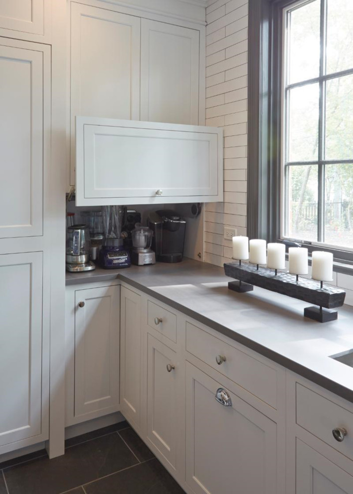 Example of a huge farmhouse porcelain tile and brown floor kitchen pantry design in Chicago with a double-bowl sink, recessed-panel cabinets, white cabinets, marble countertops, white backsplash, ceramic backsplash and stainless steel appliances