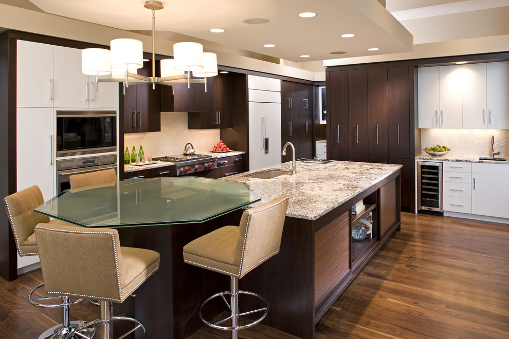 Trendy kitchen photo in Minneapolis with flat-panel cabinets and dark wood cabinets