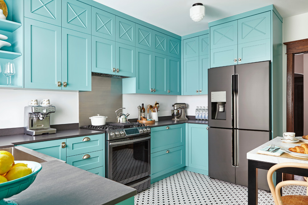 Inspiration for a tropical kitchen remodel in Toronto with a farmhouse sink, shaker cabinets, blue cabinets, metallic backsplash, metal backsplash, stainless steel appliances and no island