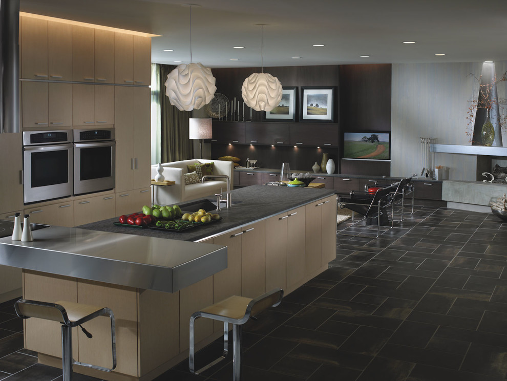 Example of a large trendy u-shaped open concept kitchen design in Los Angeles with flat-panel cabinets, light wood cabinets, stainless steel appliances and an island