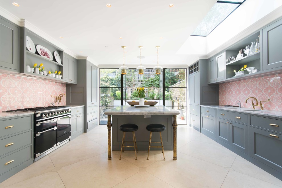 Design ideas for a contemporary galley enclosed kitchen in London with shaker cabinets, grey cabinets, multi-coloured splashback, an island and beige floors.