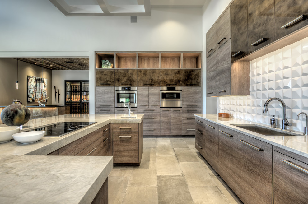 Example of a large minimalist u-shaped porcelain tile and gray floor kitchen design in Houston with a double-bowl sink, flat-panel cabinets, distressed cabinets, quartzite countertops, white backsplash, stainless steel appliances and an island