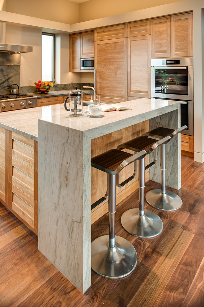 Inspiration for a large contemporary u-shaped dark wood floor open concept kitchen remodel in San Francisco with an undermount sink, recessed-panel cabinets, medium tone wood cabinets, granite countertops, stone slab backsplash, stainless steel appliances and an island