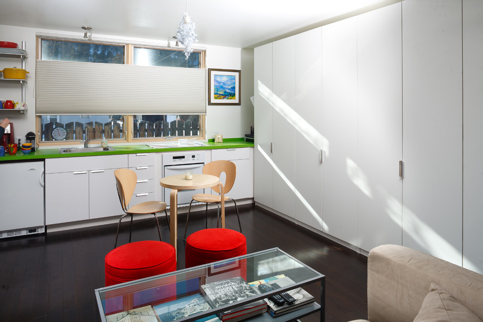 Contemporary single-wall kitchen/diner in Sacramento with a submerged sink, flat-panel cabinets and white cabinets.