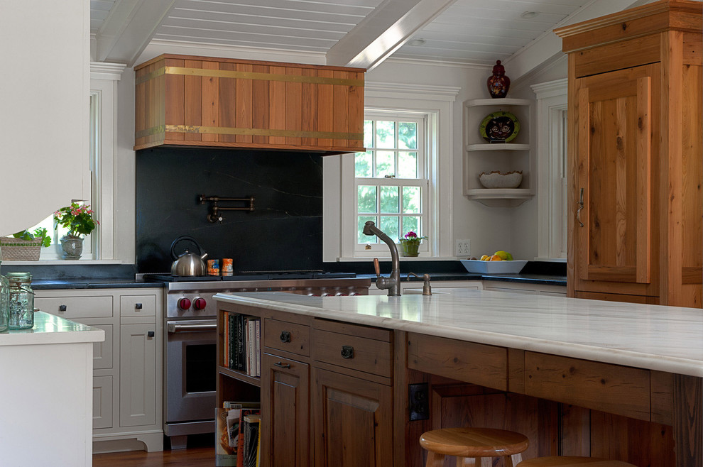 Example of a mountain style u-shaped kitchen design in New York