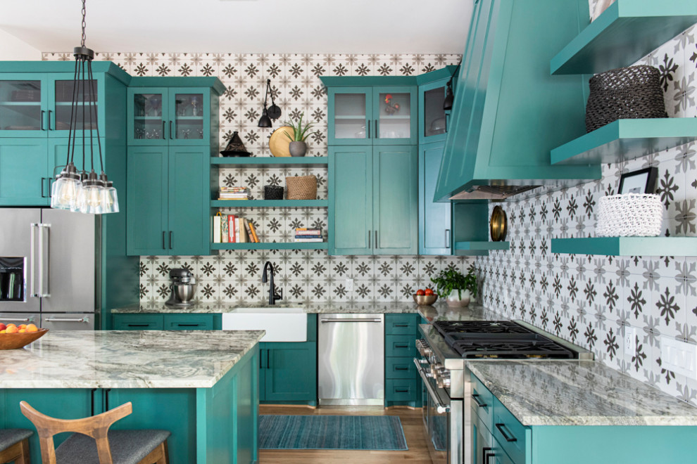 Kitchen - transitional kitchen idea in Houston with a farmhouse sink, shaker cabinets and an island
