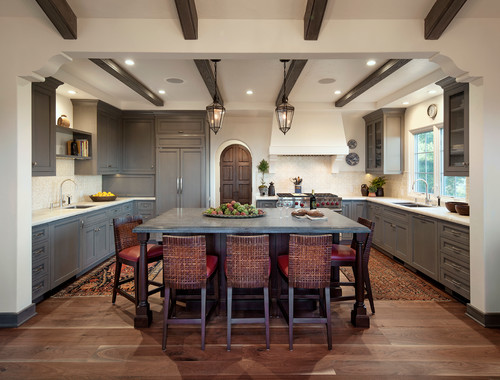 Side-by-side kitchen showing custom-made vs. stock cabinets