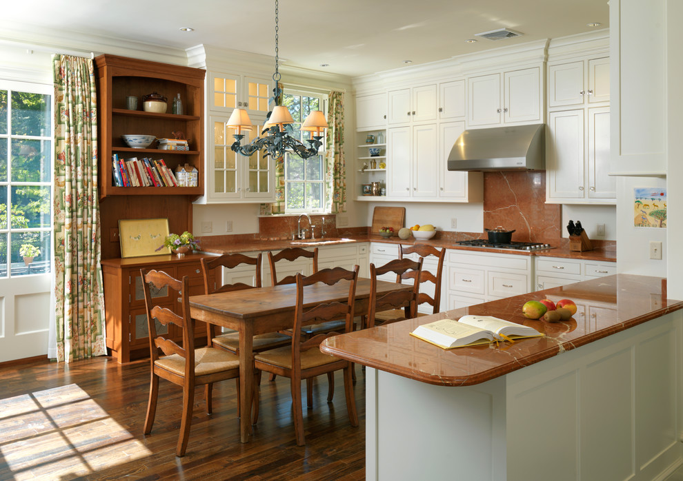 Eat-in kitchen - mid-sized traditional u-shaped dark wood floor and brown floor eat-in kitchen idea in Boston with red backsplash, stone slab backsplash, stainless steel appliances, shaker cabinets, an undermount sink and a peninsula
