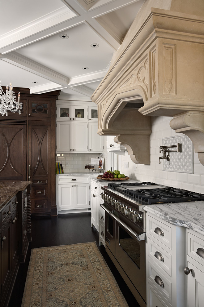 Design ideas for a traditional kitchen in Minneapolis with stainless steel appliances and metro tiled splashback.