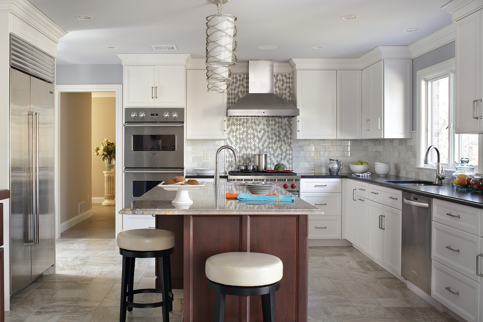 Example of a large transitional l-shaped porcelain tile eat-in kitchen design in New York with an undermount sink, recessed-panel cabinets, white cabinets, granite countertops, gray backsplash, subway tile backsplash, stainless steel appliances and an island