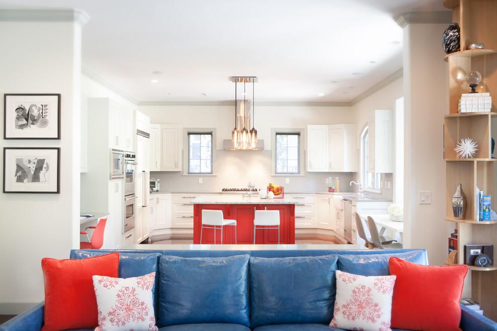 Mid-sized trendy u-shaped dark wood floor and brown floor open concept kitchen photo in San Francisco with a farmhouse sink, shaker cabinets, white cabinets, stainless steel appliances, an island, marble countertops, gray backsplash and gray countertops