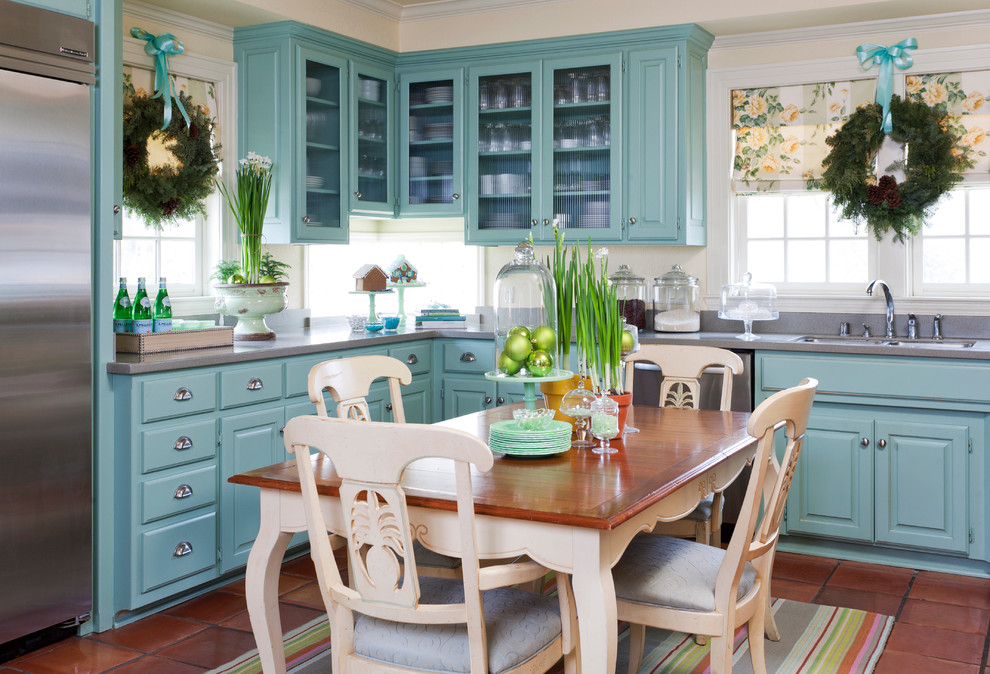 Design ideas for a rural kitchen in Little Rock with blue cabinets.