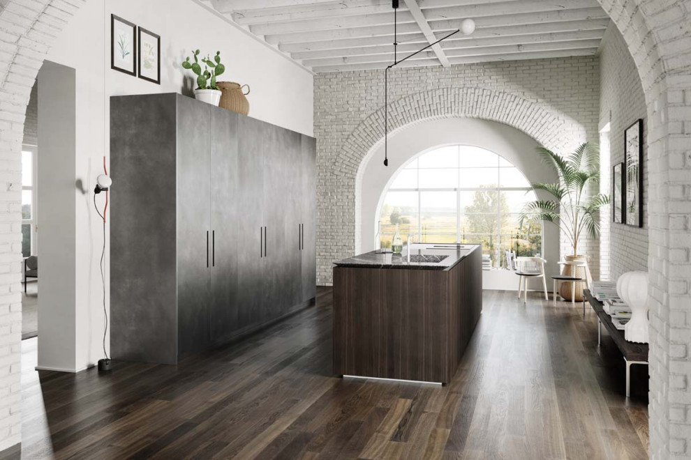 Photo of a large modern u-shaped kitchen/diner in Los Angeles with a submerged sink, flat-panel cabinets, dark wood cabinets, marble worktops, dark hardwood flooring, an island, brown floors and black worktops.