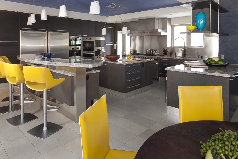 Example of a trendy kitchen design in Miami with granite countertops and stainless steel appliances