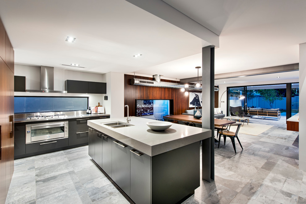 Mid-sized urban ceramic tile kitchen photo in Perth with metallic backsplash, stainless steel appliances and an island