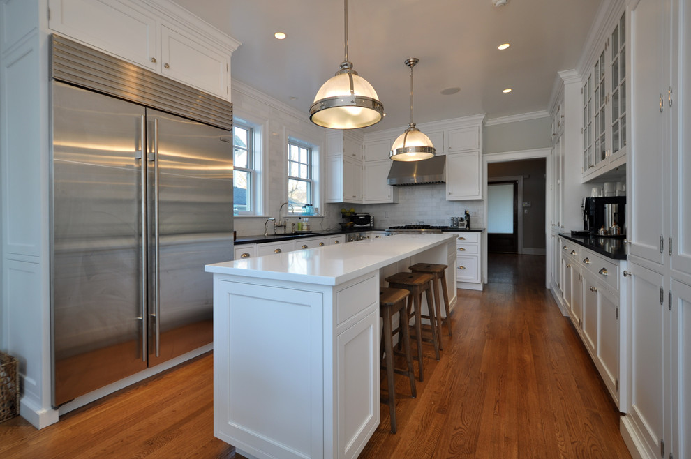 Elegant kitchen photo in New York with stainless steel appliances