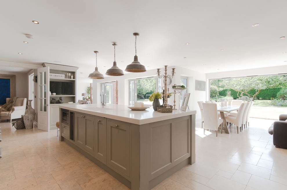 This is an example of a classic grey and cream kitchen in Surrey.