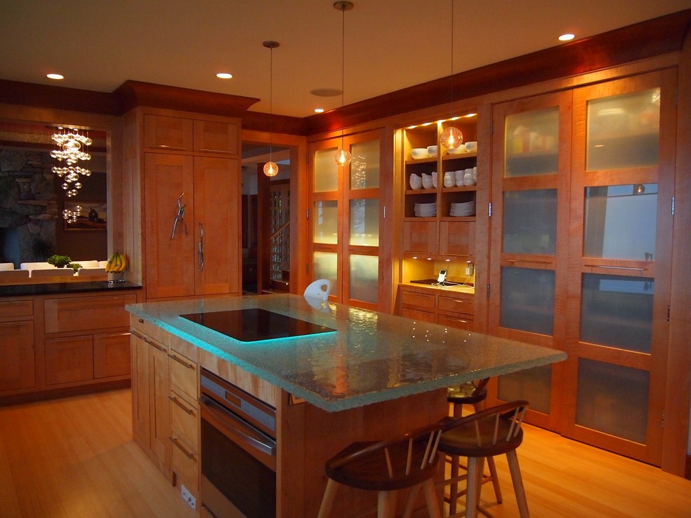 Photo of a contemporary kitchen in Portland Maine with glass worktops.