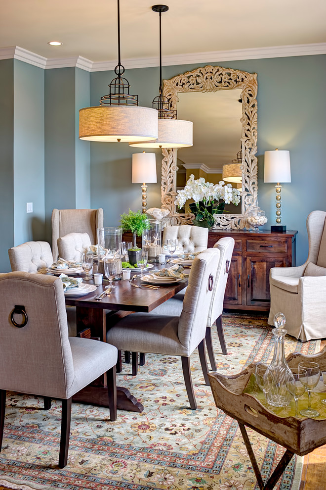 Example of an eclectic dining room design in Louisville