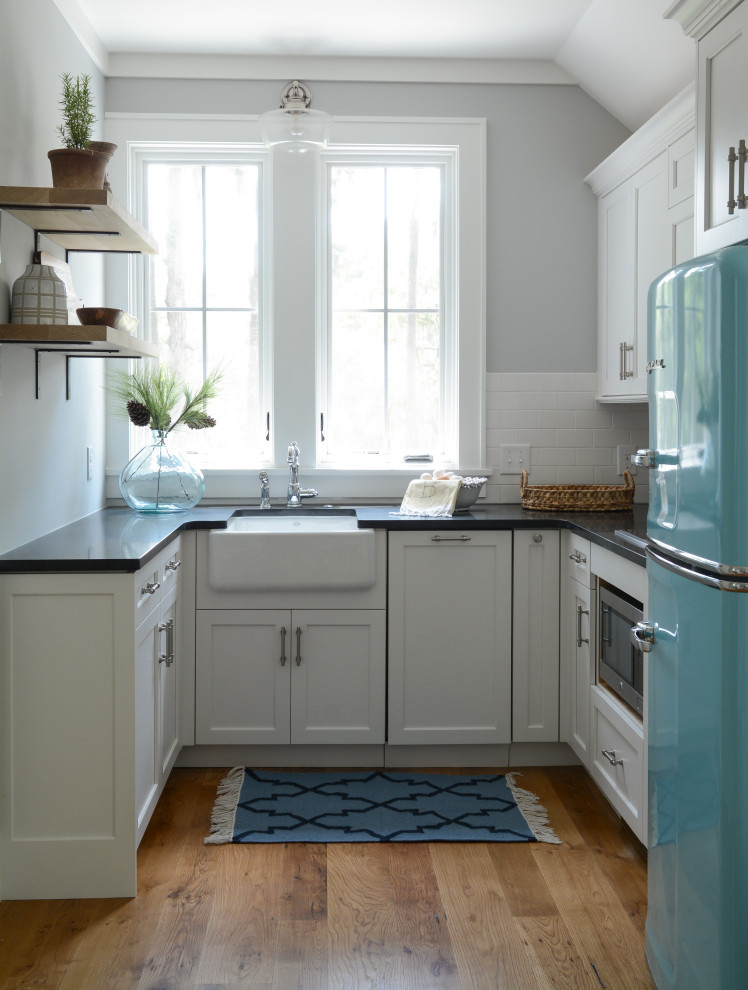 This is an example of a farmhouse kitchen in Atlanta.