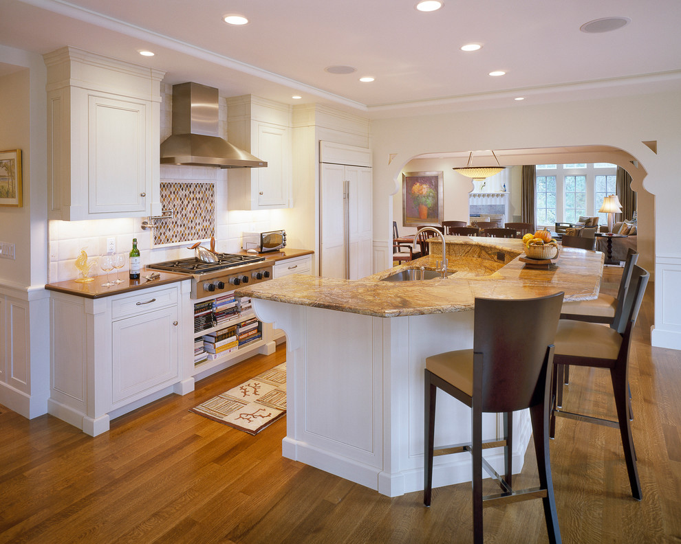 Photo of a contemporary kitchen in Boston with integrated appliances.