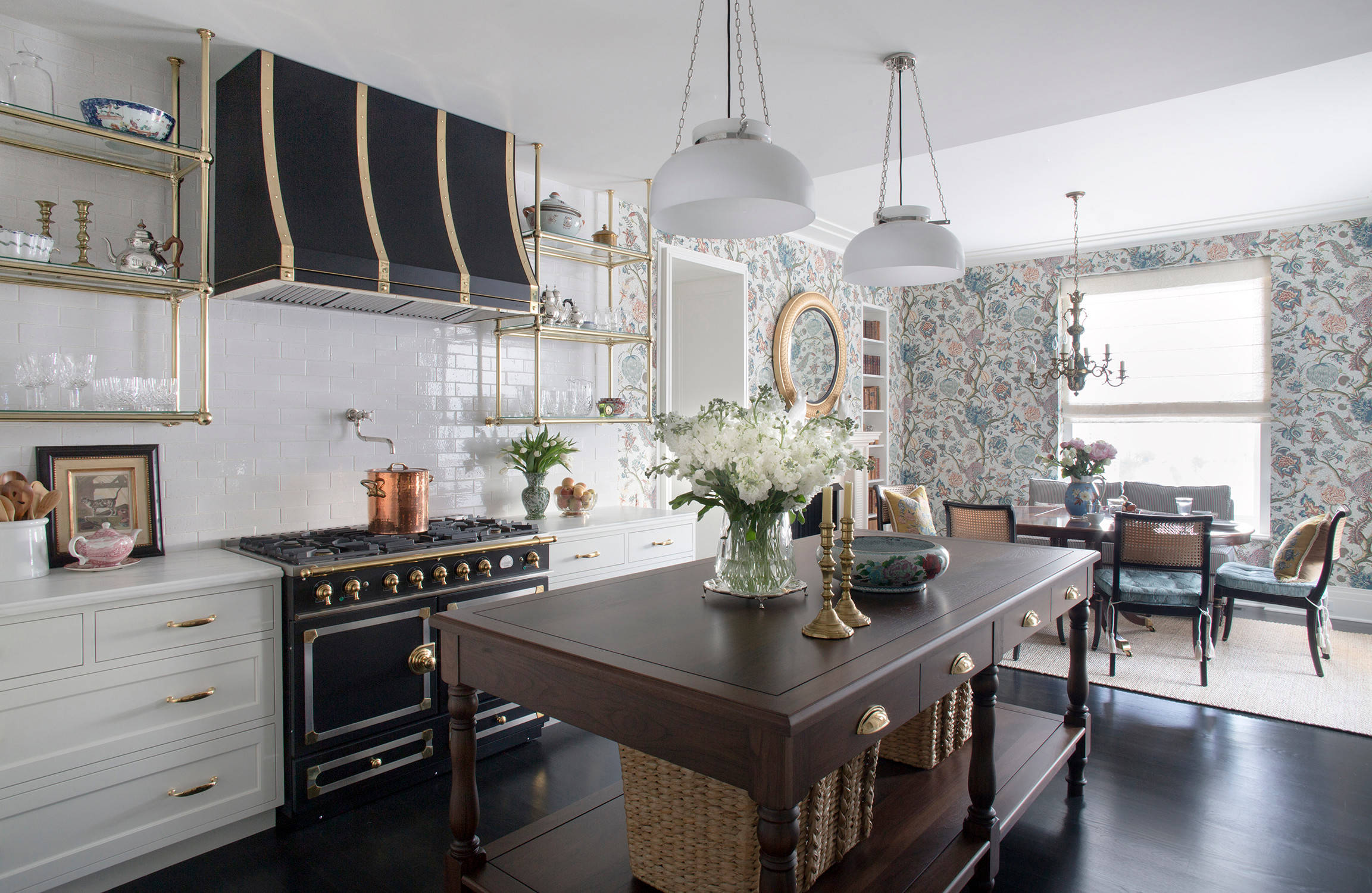 Another great example of a black and white kitchen with silver accessories!