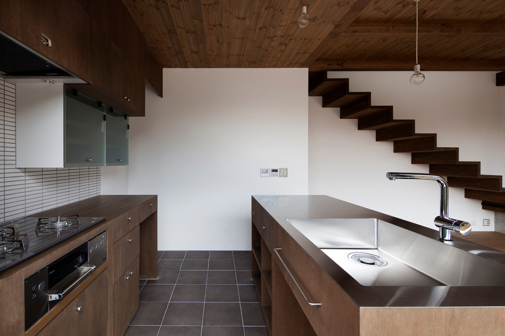 Example of a zen kitchen design in Other