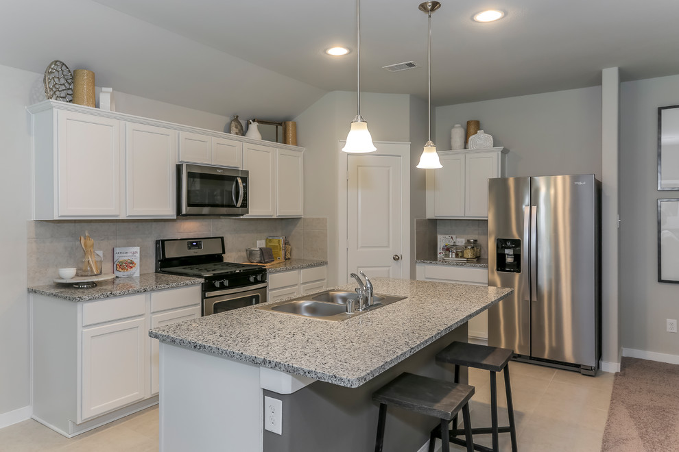 Eat-in kitchen - mid-sized contemporary l-shaped ceramic tile and beige floor eat-in kitchen idea in Houston with a double-bowl sink, shaker cabinets, white cabinets, granite countertops, gray backsplash, ceramic backsplash, stainless steel appliances, an island and gray countertops