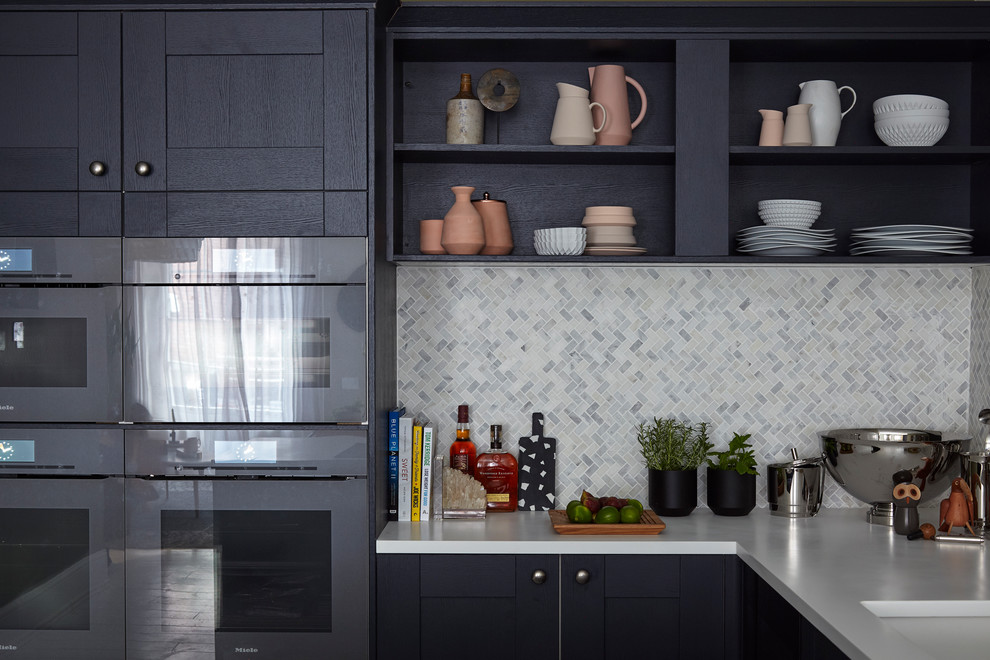 Mid-sized transitional l-shaped kitchen photo in London with open cabinets, multicolored backsplash and mosaic tile backsplash
