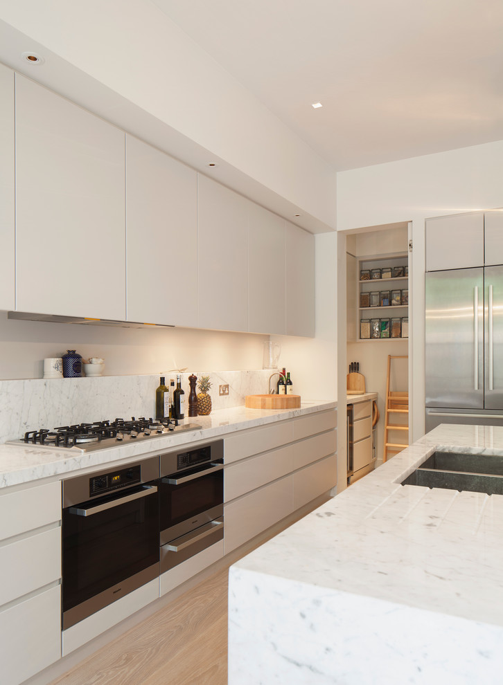 This is an example of a contemporary kitchen in London.