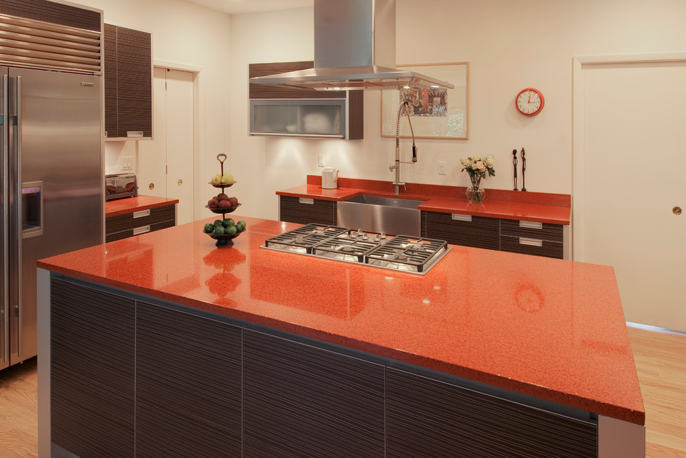 Design ideas for a contemporary kitchen in Portland with recycled glass countertops and red worktops.