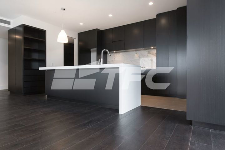 This is an example of a large modern l-shaped kitchen/diner in Melbourne.