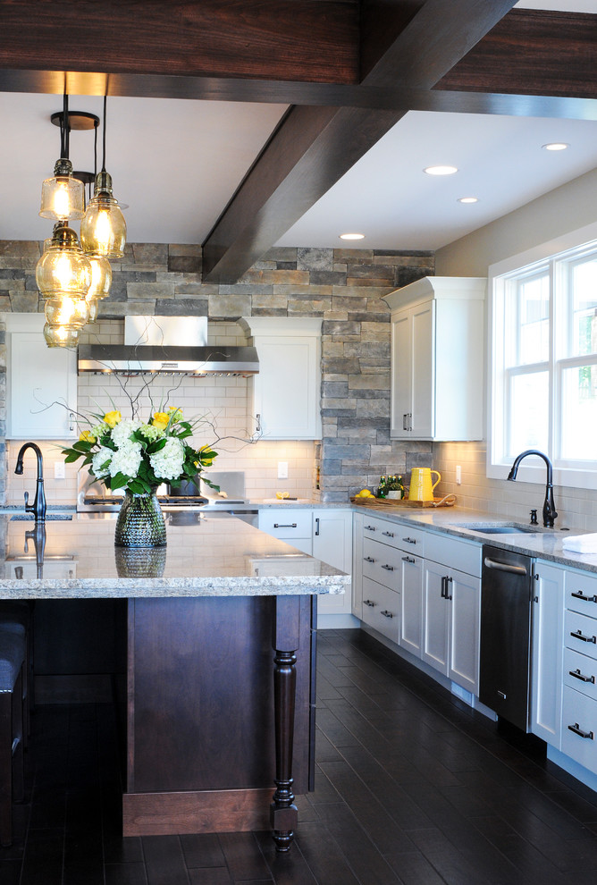 Kitchen - transitional kitchen idea in Other with an undermount sink, recessed-panel cabinets, white cabinets, granite countertops, white backsplash, subway tile backsplash, stainless steel appliances and an island