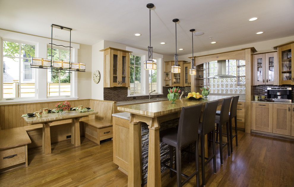 Kitchen - craftsman kitchen idea in Seattle with glass-front cabinets