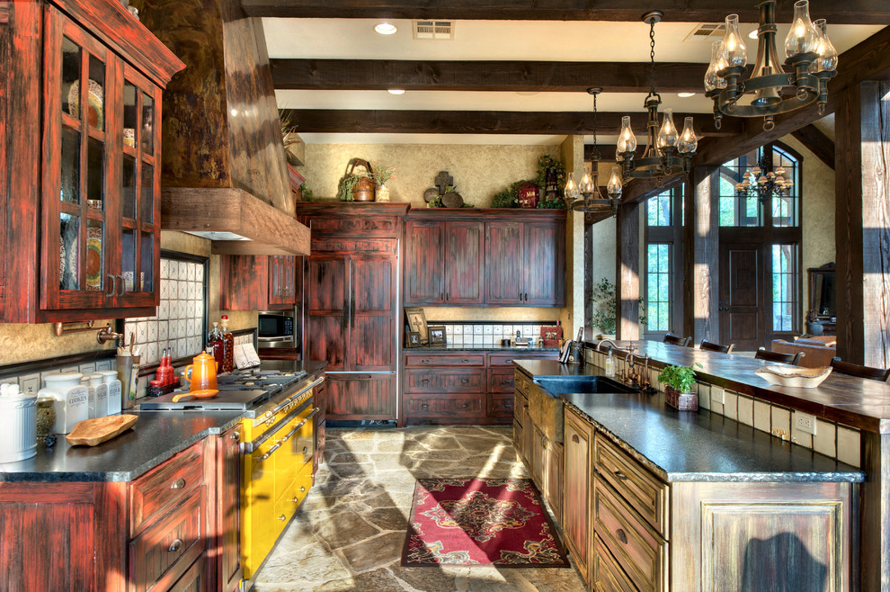 Inspiration for a rustic kitchen remodel in Houston with colored appliances