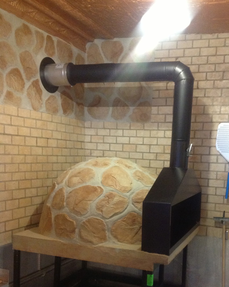 Indoor wood fired pizza oven Traditional Kitchen New York by