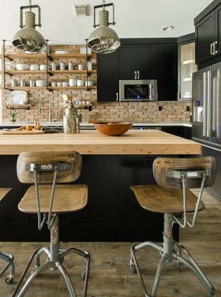 Kitchen - small industrial vinyl floor kitchen idea in Miami with a double-bowl sink, shaker cabinets, black cabinets, quartz countertops, terra-cotta backsplash, stainless steel appliances and an island