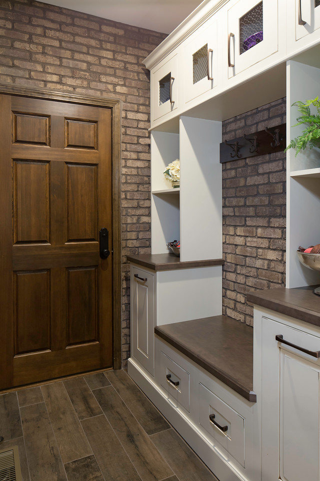 Design ideas for a medium sized urban kitchen pantry in Atlanta with a belfast sink, beaded cabinets, quartz worktops, brick splashback, stainless steel appliances and an island.