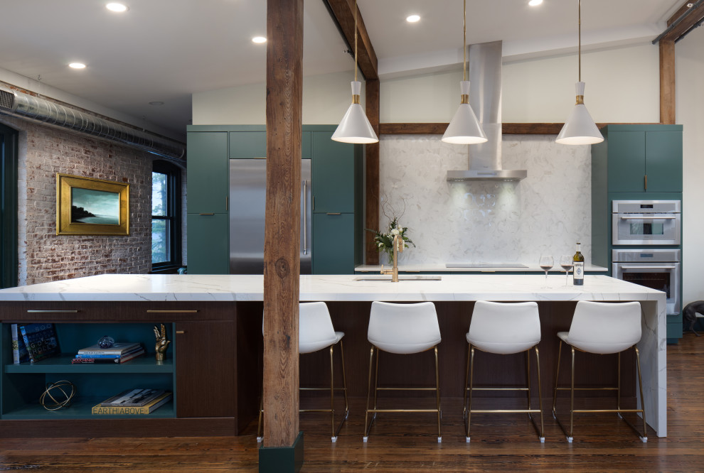 Inspiration for a mid-sized contemporary galley medium tone wood floor and brown floor open concept kitchen remodel in Other with an undermount sink, flat-panel cabinets, green cabinets, stainless steel appliances, an island, white countertops, marble countertops and multicolored backsplash