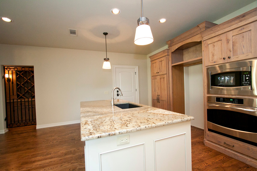 Example of a classic kitchen design in Other