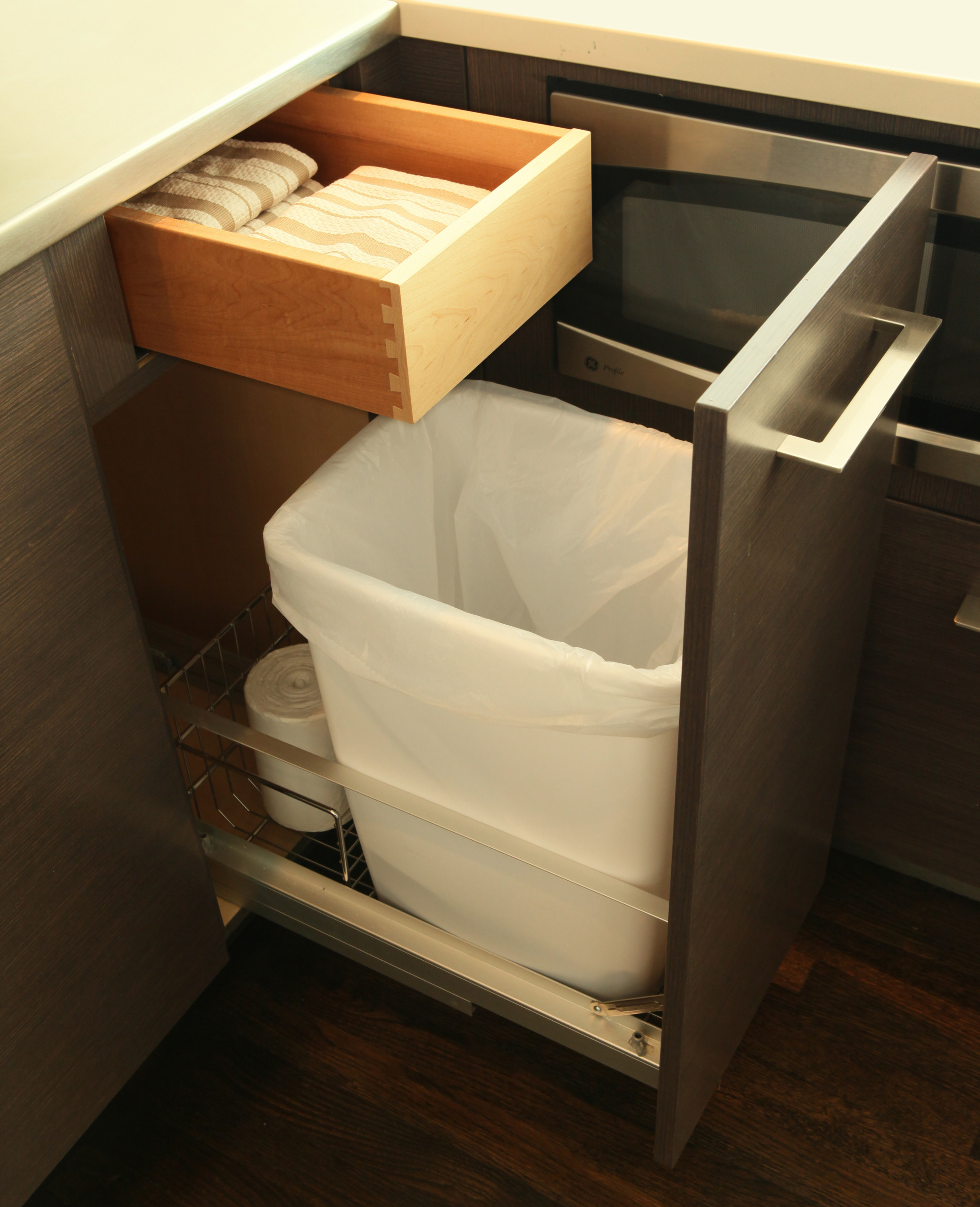 Kitchen Design Idea - Hide Pull Out Trash Bins In Your Cabinetry