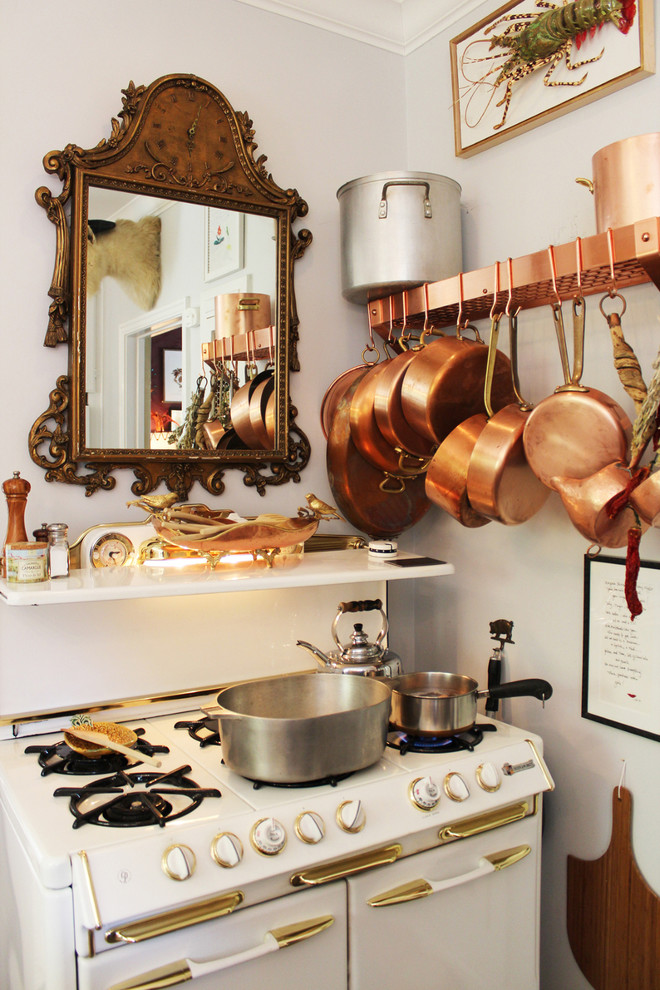 Example of a classic kitchen design in Los Angeles with white appliances