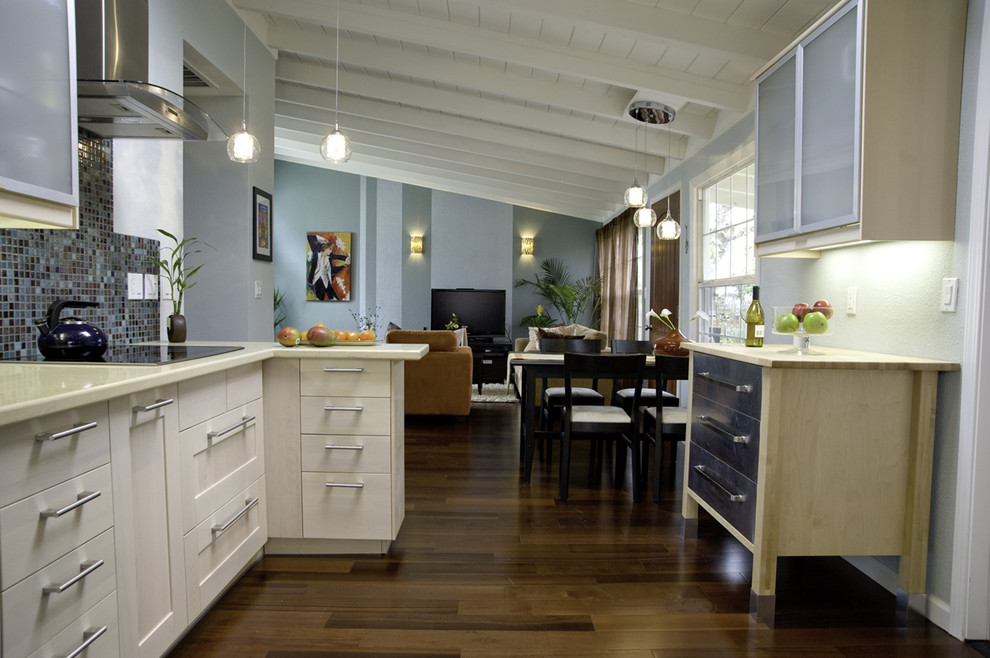 Example of a mid-sized trendy l-shaped dark wood floor open concept kitchen design in San Francisco with shaker cabinets, multicolored backsplash, mosaic tile backsplash, quartz countertops, stainless steel appliances, two islands and an undermount sink