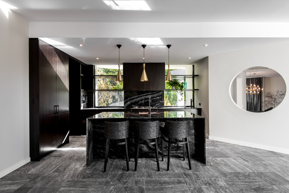 Eat-in kitchen - mid-sized modern galley ceramic tile eat-in kitchen idea in Perth with a single-bowl sink, louvered cabinets, dark wood cabinets, marble countertops, black backsplash, stone slab backsplash, black appliances and an island